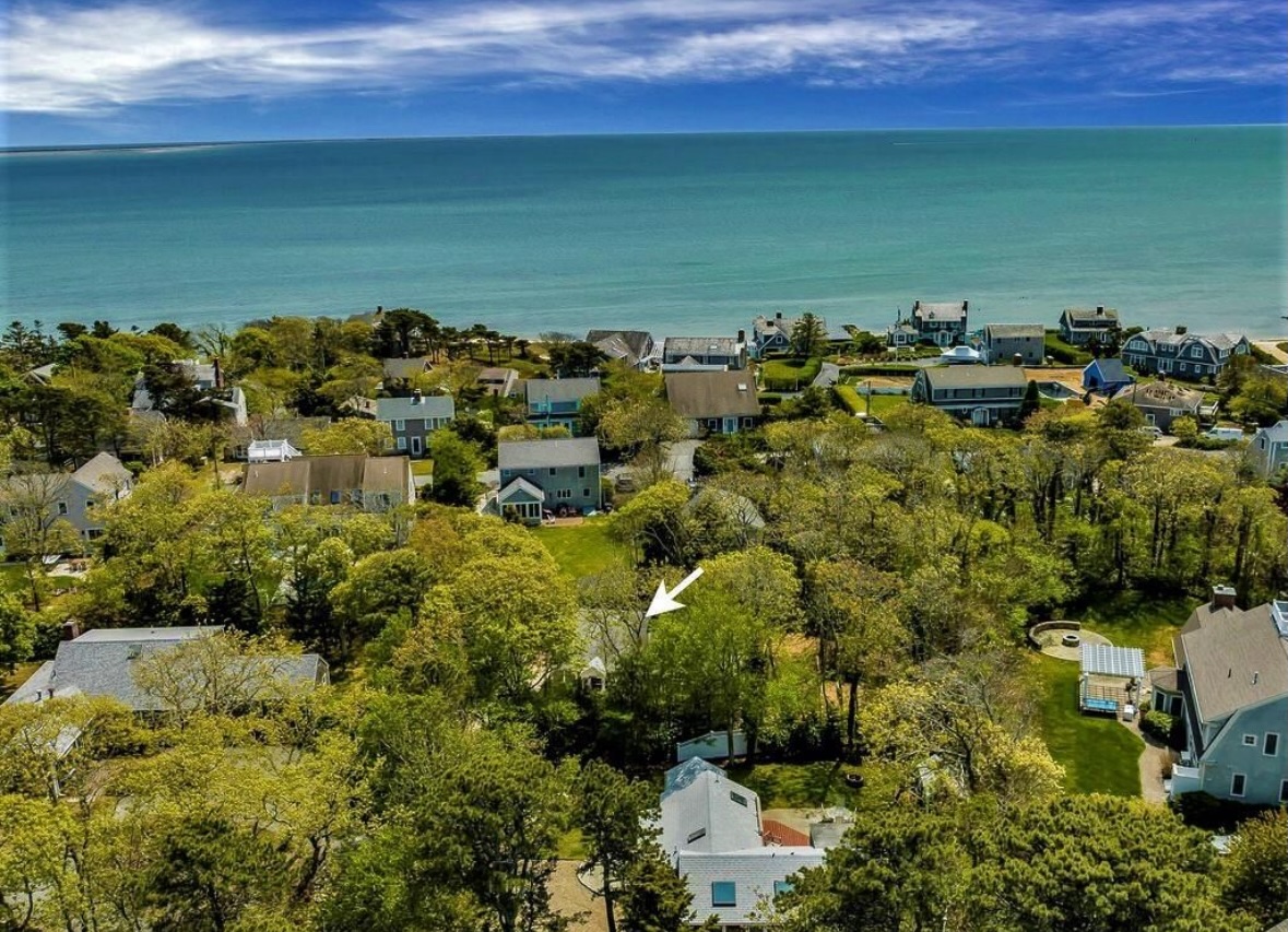 Aerial view of Soundside Cottage location with arrow pointing to the property on the coast